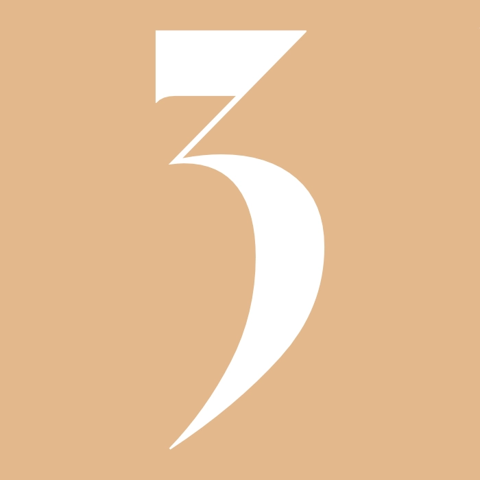 White number 3 on a light brown background