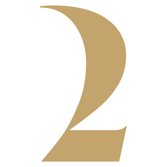 Golden number two in serif typography on a white background
