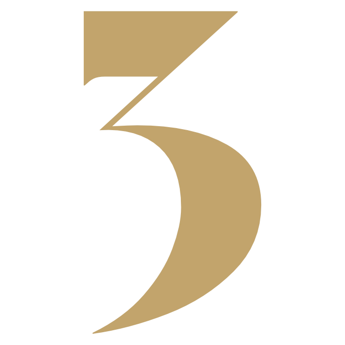 Golden number three in serif typography on a white background
