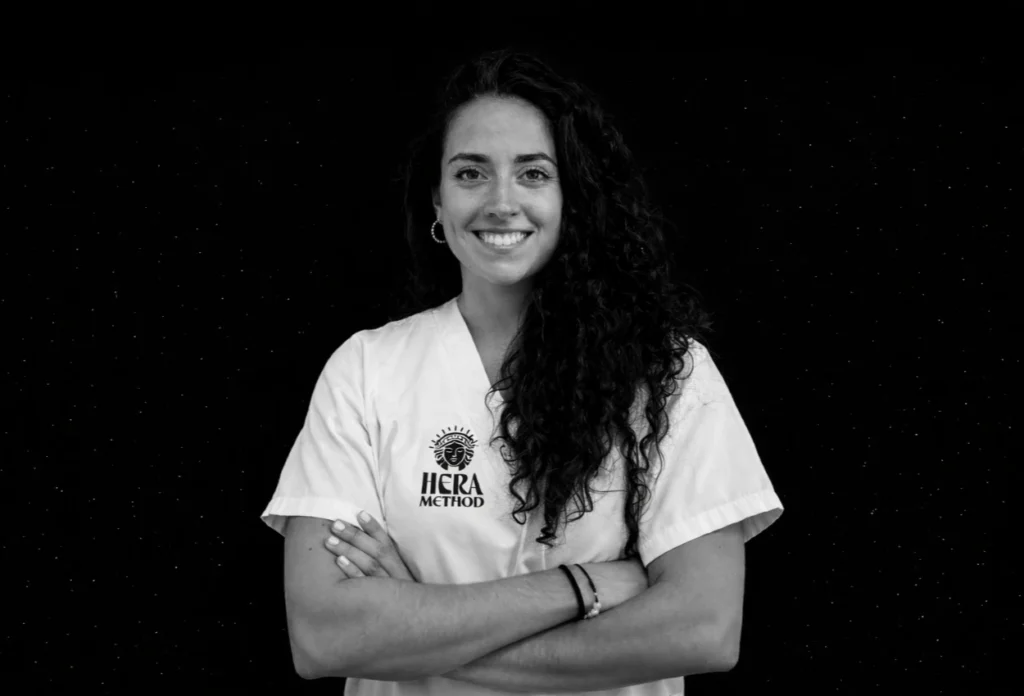 Woman in ICRA METHOD uniform, smiling with arms crossed